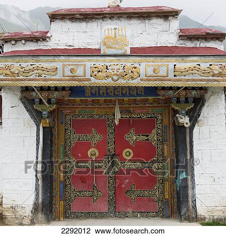 Ornate red doorway to a building; Xizang china View Large Photo Image Stock Image - Ornate red doorway to a building; Xizang china. Fotosearch