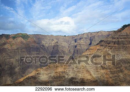 Stock Photograph - Rugged rock face of a mountainside; Hawaii united states of america. Fotosearch