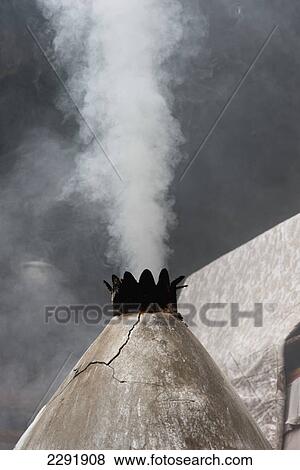 Smoke coming out of a stone cone structure; Lhasa xizang china View Large Photo Image Stock Photo - Smoke coming out of a stone cone structure; Lhasa xizang china. Fotosearch