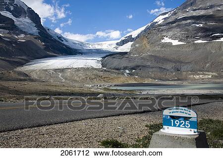 Stock Image - 1925 Glacier Marker, Athabasca Glacier, Columbia Icefield, Jasper National Park, Alberta, Canada. Fotosearch