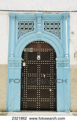 A Bright Blue Painted Frame Over An Arch Door In Old Medina; Casablanca Morocco View Large Photo Image Stock Image - A Bright Blue Painted Frame Over An Arch Door In Old Medina; Casablanca Morocco. Fotosearch