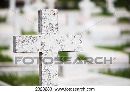 Stock Image - A cross tombstone in a cemetery; Jerusalem israel. Fotosearch