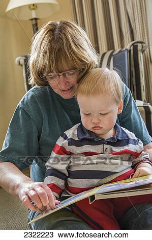 A grandmother and grandson reading together; Portland oregon united states of america View Large Photo Image Stock Image - A grandmother and grandson reading together; Portland oregon united states of america. Fotosearch