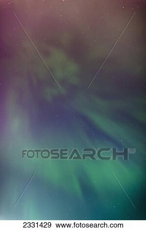 A green aurora borealis corona in the sky above the tony knowles coastal trail in winter; Anchorage alaska united states of america View Large Photo Image Stock Photo - A green aurora borealis corona in the sky above the tony knowles coastal trail in winter; Anchorage alaska united states of america. Fotosearch