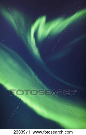 A Green Northern Lights Corona in the sky above the Tony Knowles Coastal Trail in winter; Anchorage, Alaska, United States of America View Large Photo Image Stock Image - A Green Northern Lights Corona in the sky above the Tony Knowles Coastal Trail in winter; Anchorage, Alaska, United States of America. Fotosearch