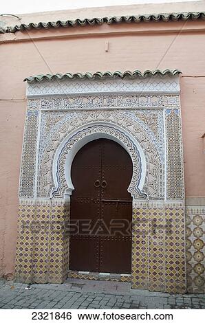 A Horseshoe Shaped Door With Ornate Facade On The Arched Entrance; Marrakech Morocco View Large Photo Image Stock Photograph - A Horseshoe Shaped Door With Ornate Facade On The Arched Entrance; Marrakech Morocco. Fotosearch