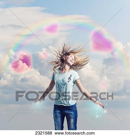A Joyful Girl With A Dreamy Background Of Hearts In The Clouds And Twinkles; Malaga Andalusia Spain View Large Photo Image Stock Photo - A Joyful Girl With A Dreamy Background Of Hearts In The Clouds And Twinkles; Malaga Andalusia Spain. Fotosearch