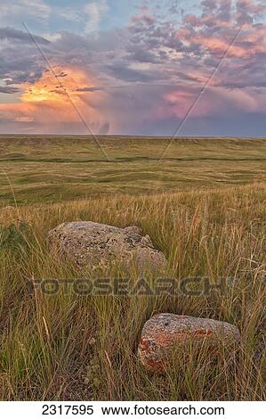 A Large Storm Cell Is Seen On The Horizon At Sunset In Grasslands National Park; Saskatchewan Canada View Large Photo Image Stock Photography - A Large Storm Cell Is Seen On The Horizon At Sunset In Grasslands National Park; Saskatchewan Canada. Fotosearch