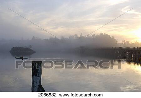 Stock Image - A Lone Kayalker On The Gorge Waterway, Victoria, Bc. Fotosearch