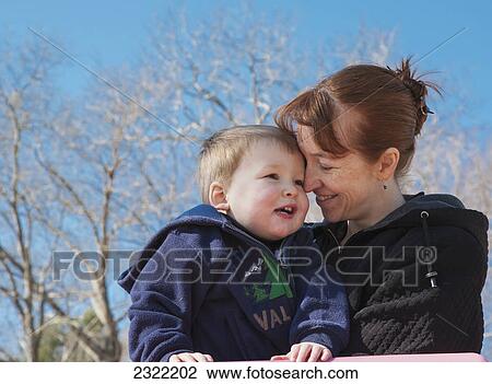 A mother with her young son; Willimantic connecticut united states of america View Large Photo Image Stock Image - A mother with her young son; Willimantic connecticut united states of america. Fotosearch