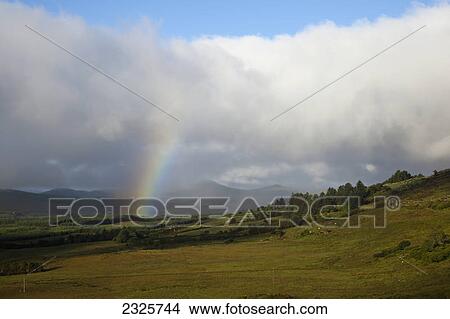 Picture - A rainbow; Blackwater county kerry ireland. Fotosearch