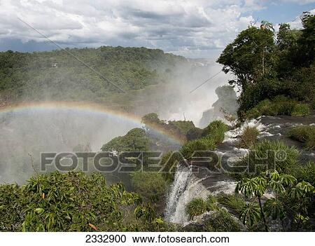 A rainbow over iguaza falls; Argentina View Large Photo Image Stock Image - A rainbow over iguaza falls; Argentina. Fotosearch