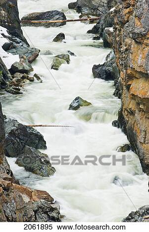 Stock Photography - A River Flows In Manning Provincial Park, Bc. Fotosearch