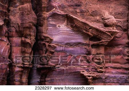 A rugged rock wall of colourful sandstone; Petra jordan View Large Photo Image Stock Photo - A rugged rock wall of colourful sandstone; Petra jordan. Fotosearch