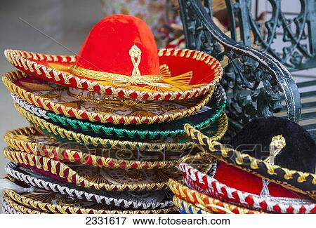 Stock Photo - A sombrero is a typical souvenir found in shops in mexico; Puerto vallarta mexico. Fotosearch