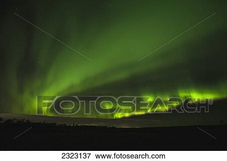 Stock Photo - A spiral of northern lights; Alberta canada. Fotosearch