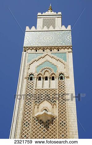 Stock Photo - A Tall Tower With A Blue Design On The Facade; Casablanca Morocco. Fotosearch