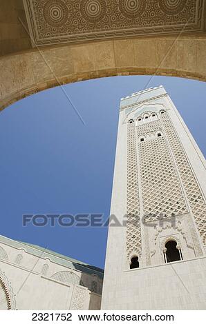 A Tall White Tower Against A Blue Sky; Casablanca Morocco View Large Photo Image Stock Image - A Tall White Tower Against A Blue Sky; Casablanca Morocco. Fotosearch