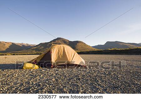 A tent and the mountains of the brooks range gates of the arctic national park northwestern alaska; Alaska united states of america View Large Photo Image Stock Photo - A tent and the mountains of the brooks range gates of the arctic national park northwestern alaska; Alaska united states of america. Fotosearch