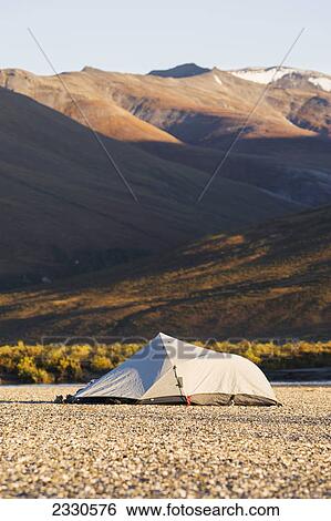 A tent and the mountains of the brooks range gates of the arctic national park northwestern alaska; Alaska united states of america View Large Photo Image Stock Photograph - A tent and the mountains of the brooks range gates of the arctic national park northwestern alaska; Alaska united states of america. Fotosearch