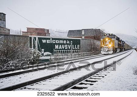 A train entering maysville in winter with a welcome sign along the tracks; Maysville ohio united states of america View Large Photo Image Stock Image - A train entering maysville in winter with a welcome sign along the tracks; Maysville ohio united states of america. Fotosearch