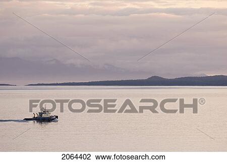 A Tugboat Passes The Dallas Road Waterfront In Victoria, Bc View Large Photo Image Stock Image - A Tugboat Passes The Dallas Road Waterfront In Victoria, Bc. Fotosearch
