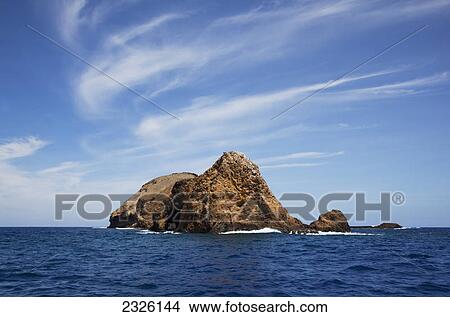 A view of the moku ho'oniki rock; Molokai hawaii united states of america View Large Photo Image Picture - A view of the moku ho'oniki rock; Molokai hawaii united states of america. Fotosearch