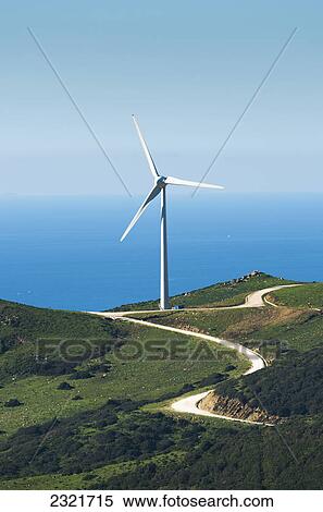 A Wind Turbine Along The Water's Edge; Tarifa Cadiz Andalusia Spain View Large Photo Image Stock Photography - A Wind Turbine Along The Water's Edge; Tarifa Cadiz Andalusia Spain. Fotosearch