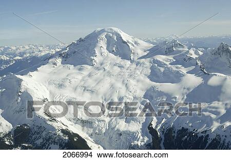 Picture - Aerial Photo Of A Dormant Snowcapped Volcano, Mount Baker, Washington, Usa. Fotosearch