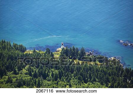 Stock Photograph - Aerial View Of A Light House, West Coast Vancouver Island, British Columbia, Canada. Fotosearch