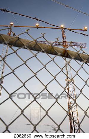 Airport Approach Towers And Chain Link Fence, Victoria International Airport Near Sidney, Bc, Canada View Large Photo Image Stock Image - Airport Approach Towers And Chain Link Fence, Victoria International Airport Near Sidney, Bc, Canada. Fotosearch
