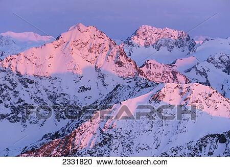 Stock Image - Alpenglow on eagle peak chugach mountains; Alaska united states of america. Fotosearch