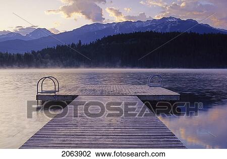 Alta Lake At Dawn, With Dock In Foreground And Blackcomb Mtn Behind View Large Photo Image Stock Image - Alta Lake At Dawn, With Dock In Foreground And Blackcomb Mtn Behind. Fotosearch
