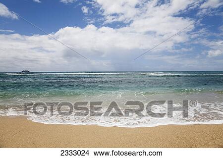 Picture - An empty shoreline and a cruise ship in the far distance; Honolulu oahu hawaii united states of america. Fotosearch