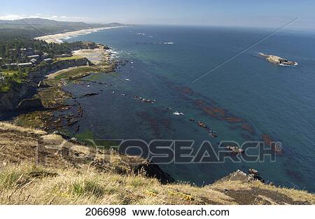 Stock Photo - Aqua Coloured Ocean And Rocky Shoreline, Oregon Coast, Oregon, Usa. Fotosearch