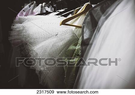 Stock Photo - Ballet Costumes And Tutus On Hangers; Beloeil Quebec Canada. Fotosearch