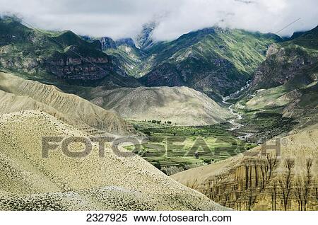 Beautiful mountain landscape; Ghemi village upper mustang nepal View Large Photo Image Stock Photography - Beautiful mountain landscape; Ghemi village upper mustang nepal. Fotosearch
