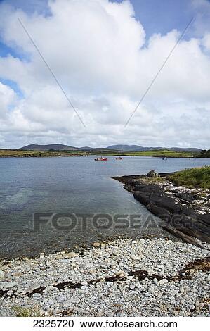 Stock Image - Boats in dunmanus bay near durrus; County cork ireland. Fotosearch