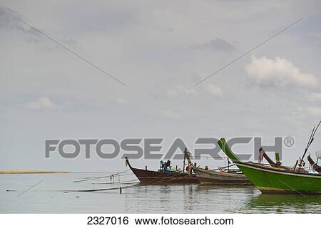 Boats mooring at nai yang beach; Phuket thailand View Large Photo Image Stock Photograph - Boats mooring at nai yang beach; Phuket thailand. Fotosearch