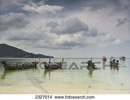 Boats mooring at nai yang beach; Puket thailand View Large Photo Image Picture - Boats mooring at nai yang beach; Puket thailand. Fotosearch