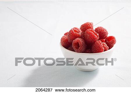 Bowl Of Raspberries View Large Photo Image Stock Photo - Bowl Of Raspberries. Fotosearch