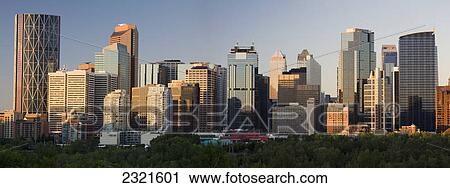 Calgary Skyline At Sunrise With Blue Sky; Calgary Alberta Canada View Large Photo Image Stock Image - Calgary Skyline At Sunrise With Blue Sky; Calgary Alberta Canada. Fotosearch