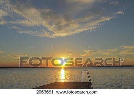 Clear Lake At Sunset; Canada, Manitoba, Riding Mountain National Park View Large Photo Image Stock Image - Clear Lake At Sunset; Canada, Manitoba, Riding Mountain National Park. Fotosearch