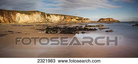 Cliffs In The Sunlight Along The Coast; South Shields Tyne And Wear England View Large Photo Image Stock Image - Cliffs In The Sunlight Along The Coast; South Shields Tyne And Wear England. Fotosearch