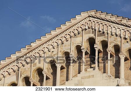 Close Up Of A Building's Roofline And Romanesque Architecture Of Columns And Arches With Blue Sky; Parma Emilia-Romagna Italy View Large Photo Image Stock Image - Close Up Of A Building's Roofline And Romanesque Architecture Of Columns And Arches With Blue Sky; Parma Emilia-Romagna Italy. Fotosearch