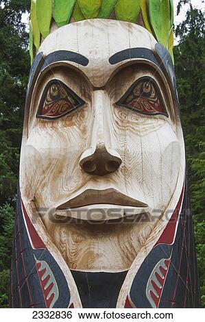 Stock Photograph - Close up of a Totem in Sitka National Historical Park, Southeast Alaska, Fall. Fotosearch