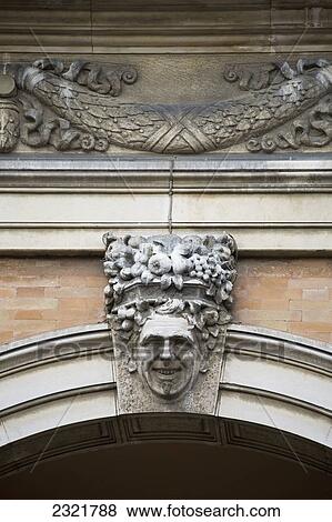 Stock Photo - Close Up Of Decorative Stone Smiley Face On Top Of Archway; Ravenna Emilia-Romagna Italy. Fotosearch