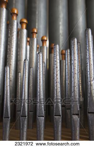 Stock Image - Close Up Of Silver Pipes On A Musical Instrument; Northumberland England. Fotosearch
