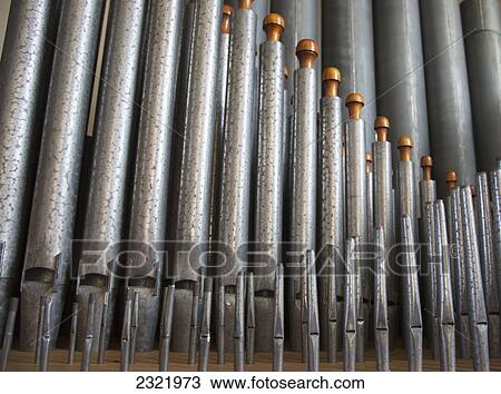 Stock Image - Close Up Of Silver Pipes On A Musical Instrument; Northumberland England. Fotosearch