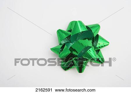 Closeup Of One Shiny Green Christmas Gift Bow On White Background Studio Portrait View Large Photo Image Stock Image - Closeup Of One Shiny Green Christmas Gift Bow On White Background Studio Portrait. Fotosearch